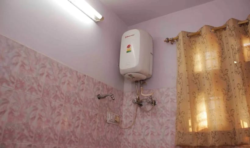 Attached bathroom with geyser