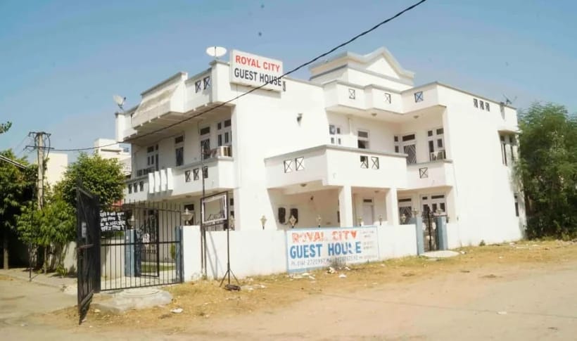 Royal City Guest House — front signboard
